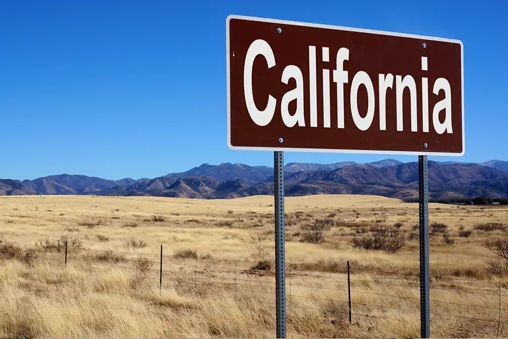 USDOT is withholding 0 million in California funds after the state did not revoke improperly issued CDLs, citing concerns about compliance and road safety.