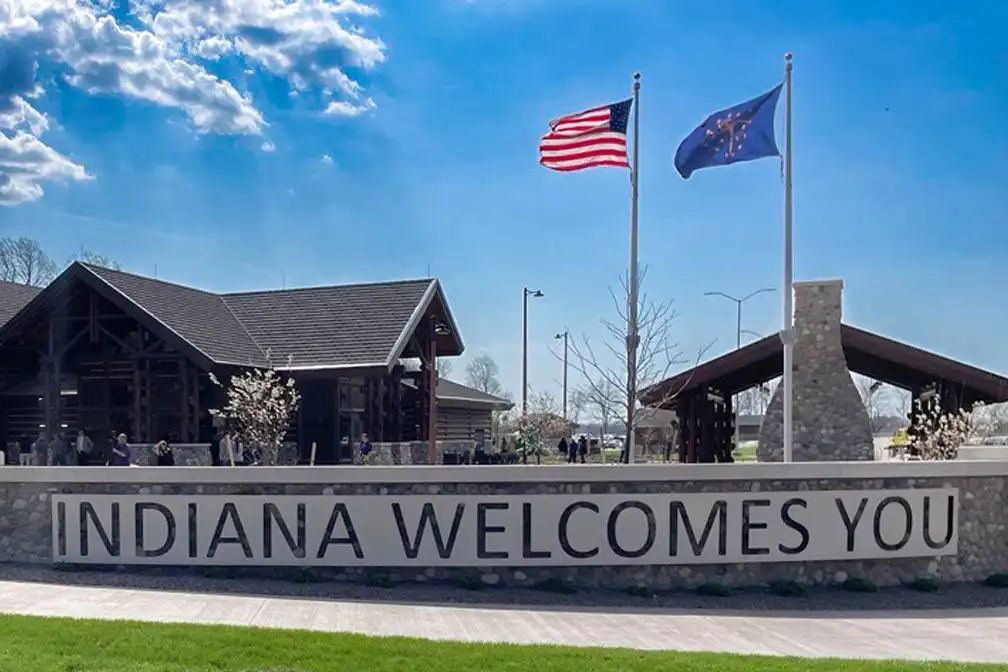The I-64 welcome center opens in Indiana with 75 truck parking spaces, new amenities, and part of a statewide plan to expand rest areas and improve safety.