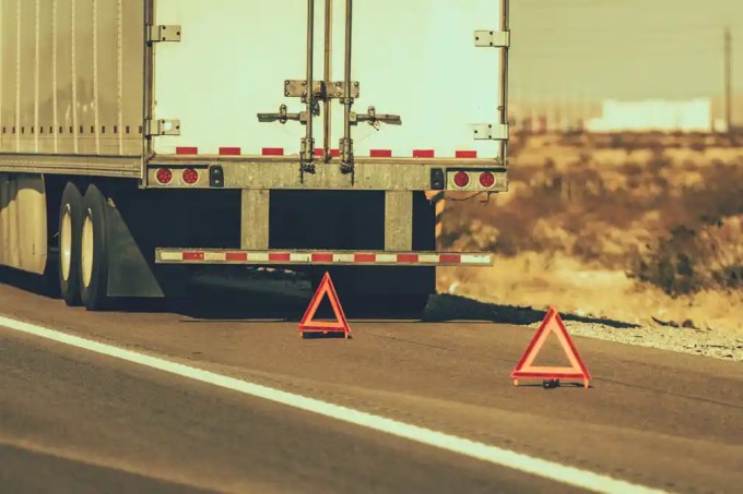 FMCSA reviews Aurora Operations' request to replace warning triangle use with cab-mounted beacons on ADS trucks, seeking public comment on a proposed exemption.