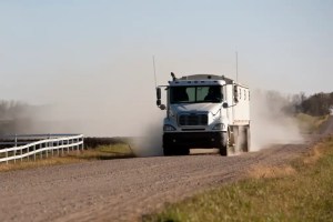 Kansas officials approved $500 fines for commercial trucks using gravel roads to avoid posted DOT detour routes during closures in Hodgeman County.