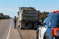 Arkansas Highway Police will increase secure load enforcement in July, focusing on waste haulers, loose loads, and highway debris violations.