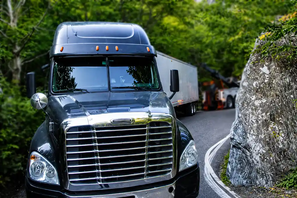 Smugglers' Notch penalties will increase on July 1 after Vermont approved a new law that raises fines to $20,000 for trucks that become stuck.
