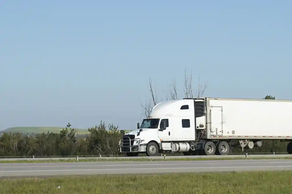 New national research links truck safety to enforcement, truck parking, work zones, roadway design, and vehicle technology as traffic deaths decline.